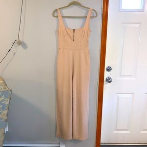 GUESS - Pale pink jumpsuit with pockets and side-slits from Guess.